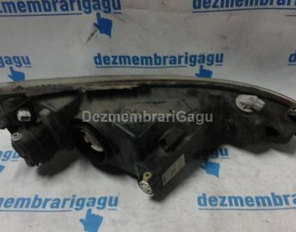Far stanga Peugeot 206