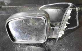 Piese auto din dezmembrari Oglinda stanga Volkswagen Caddy Iii