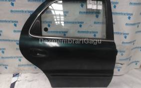 Piese auto din dezmembrari Broasca usa ds Kia Clarus