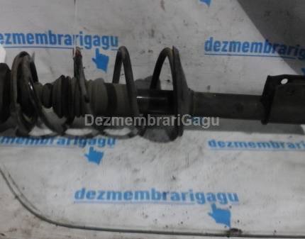 Arc fata stanga Dacia Logan