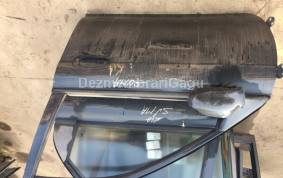 Piese auto din dezmembrari Oglinda stanga Kia Shuma Ii