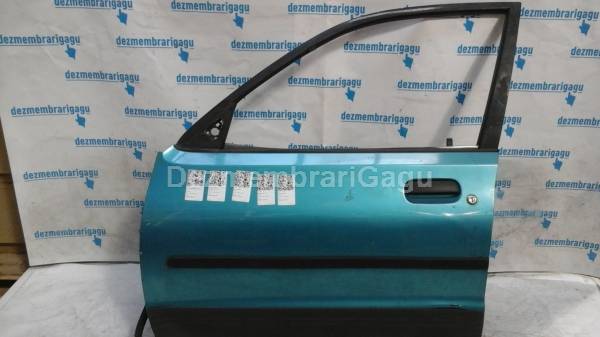 Usa stanga fata portiera stg Mazda 121 I